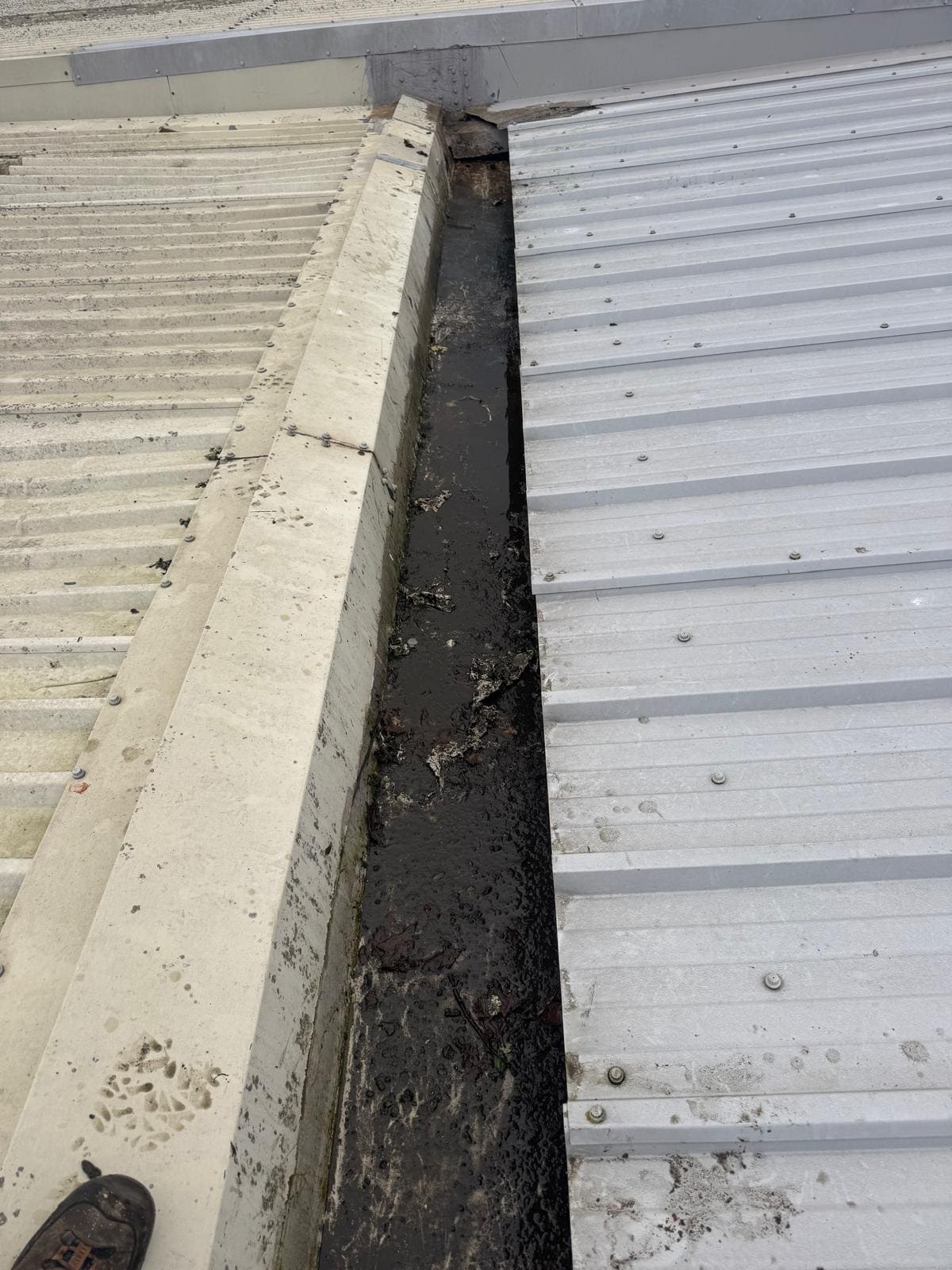 Close-up of commercial gutter after thorough cleaning
