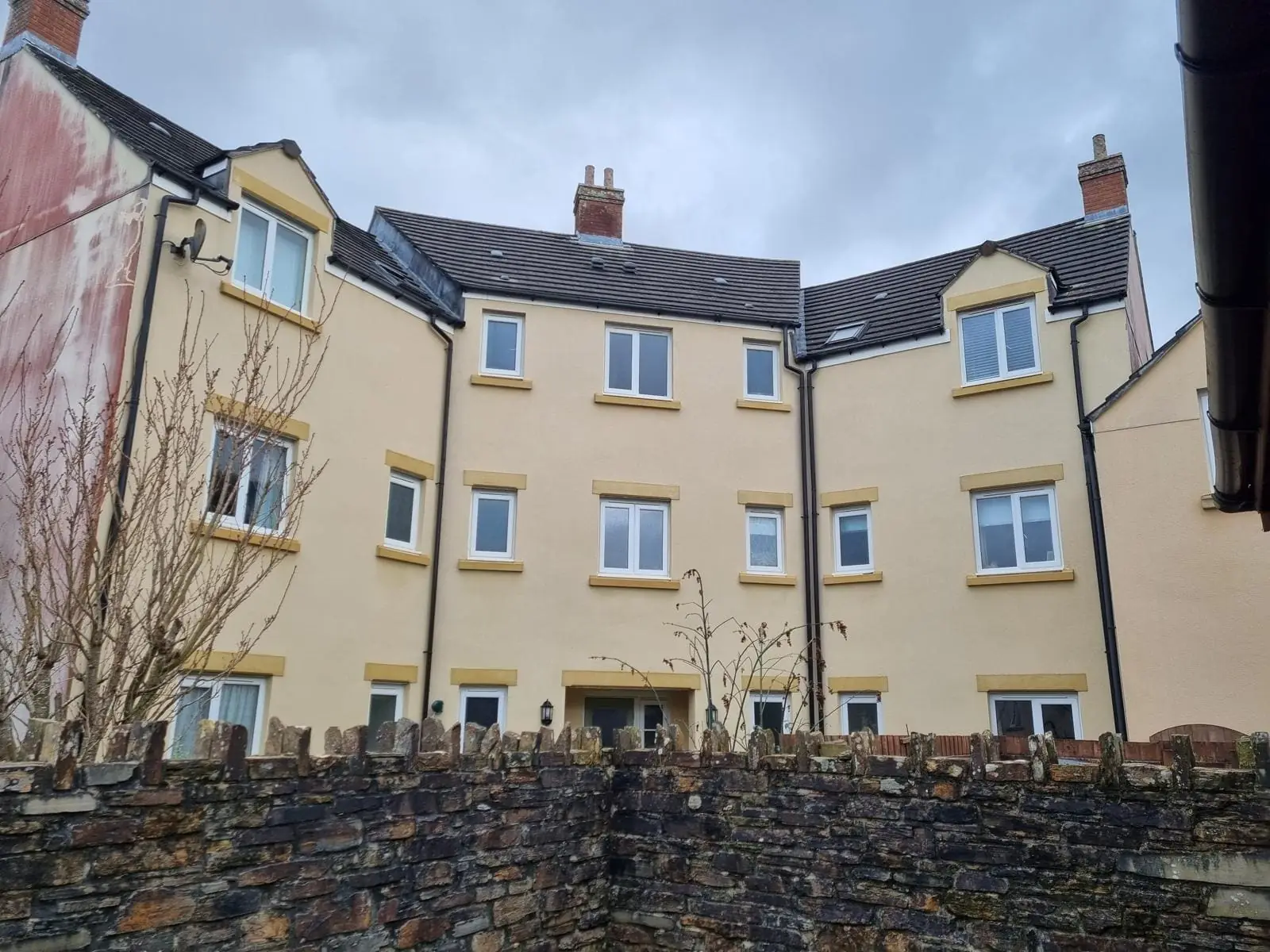 Rendered building exterior fully cleaned and restored