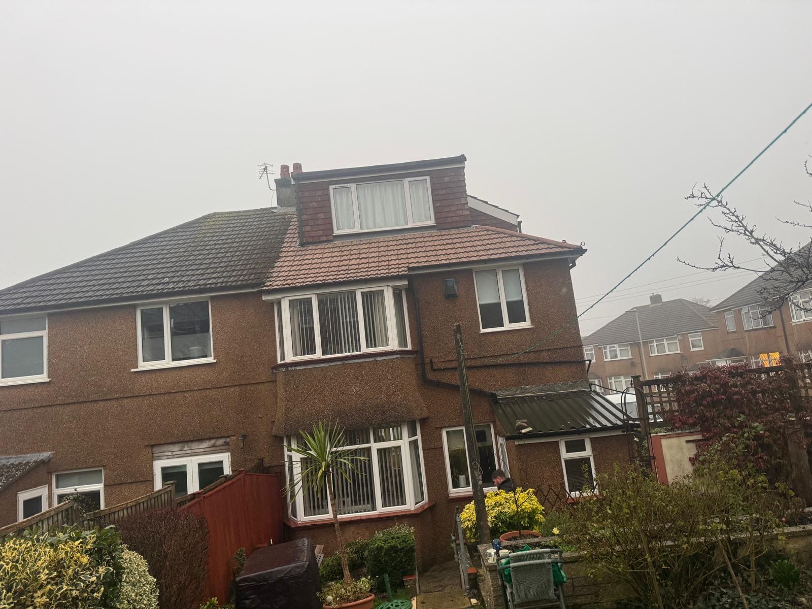 Residential house roof before professional cleaning in Devon