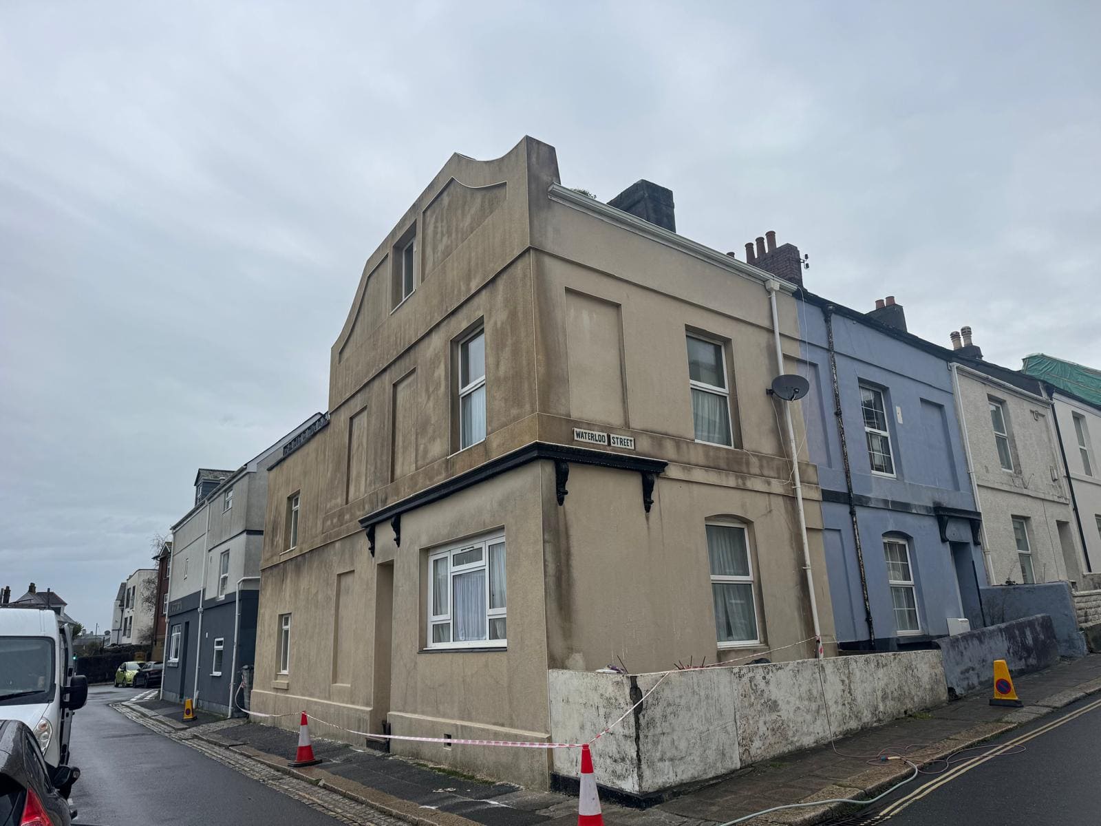 Render wall before softwash showing biological growth