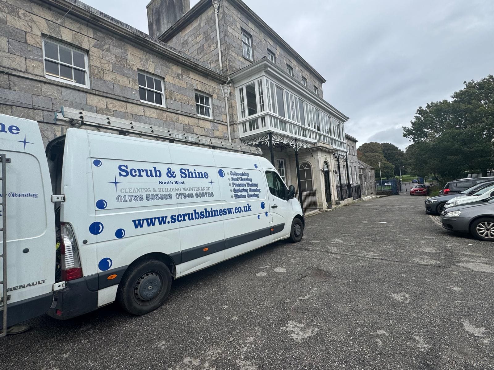 Scrub and Shine van parked at historic building project