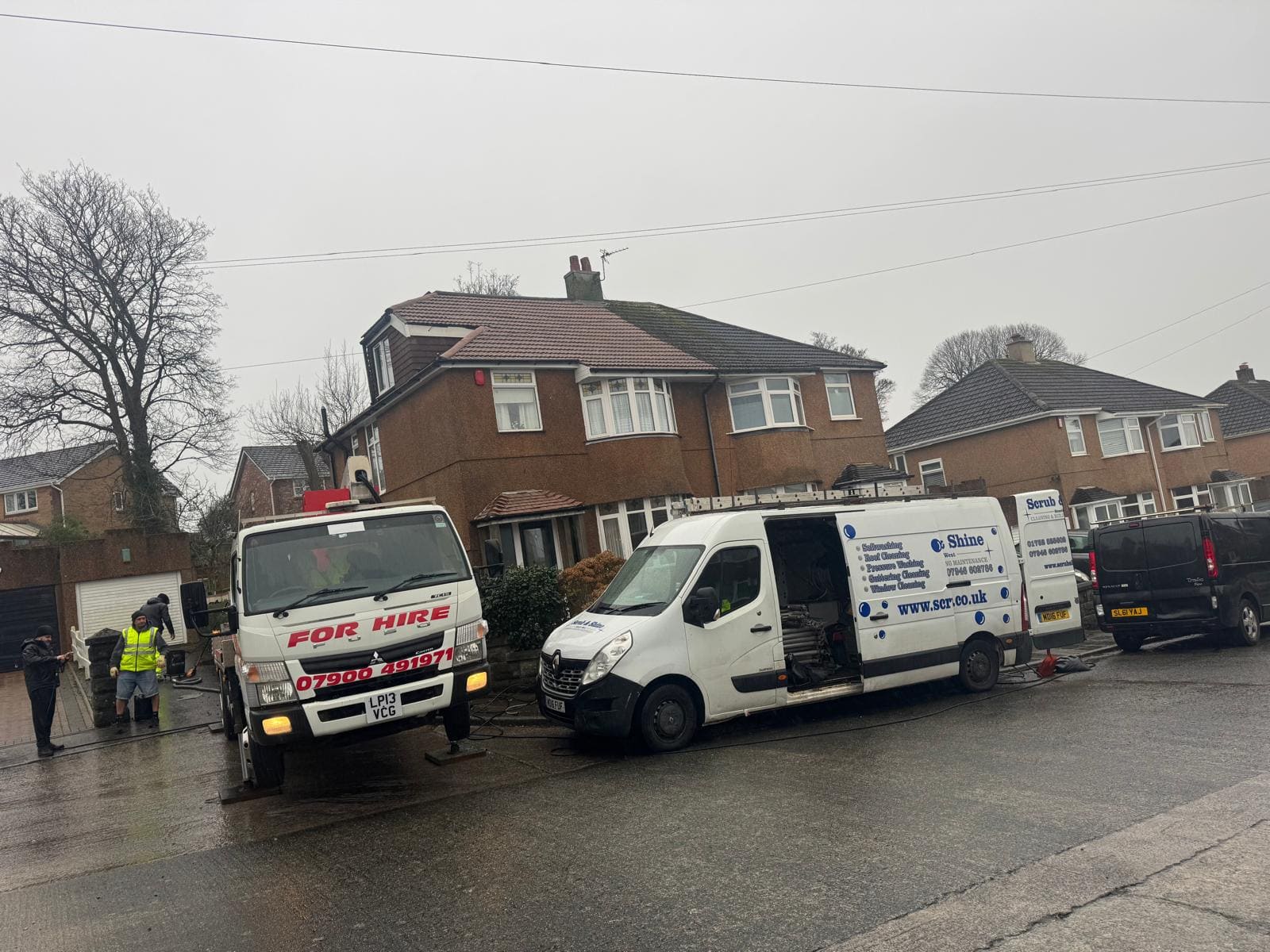 Multiple Scrub and Shine vans at residential cleaning project